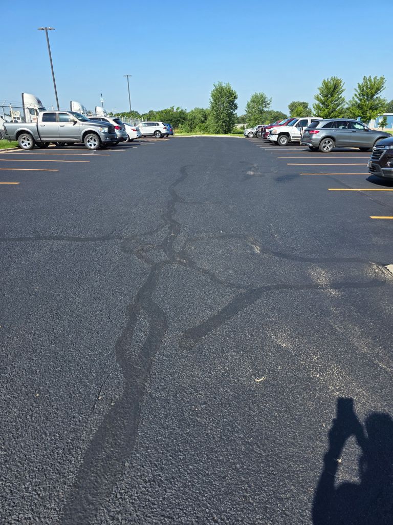 Asphalt with crack fill repair