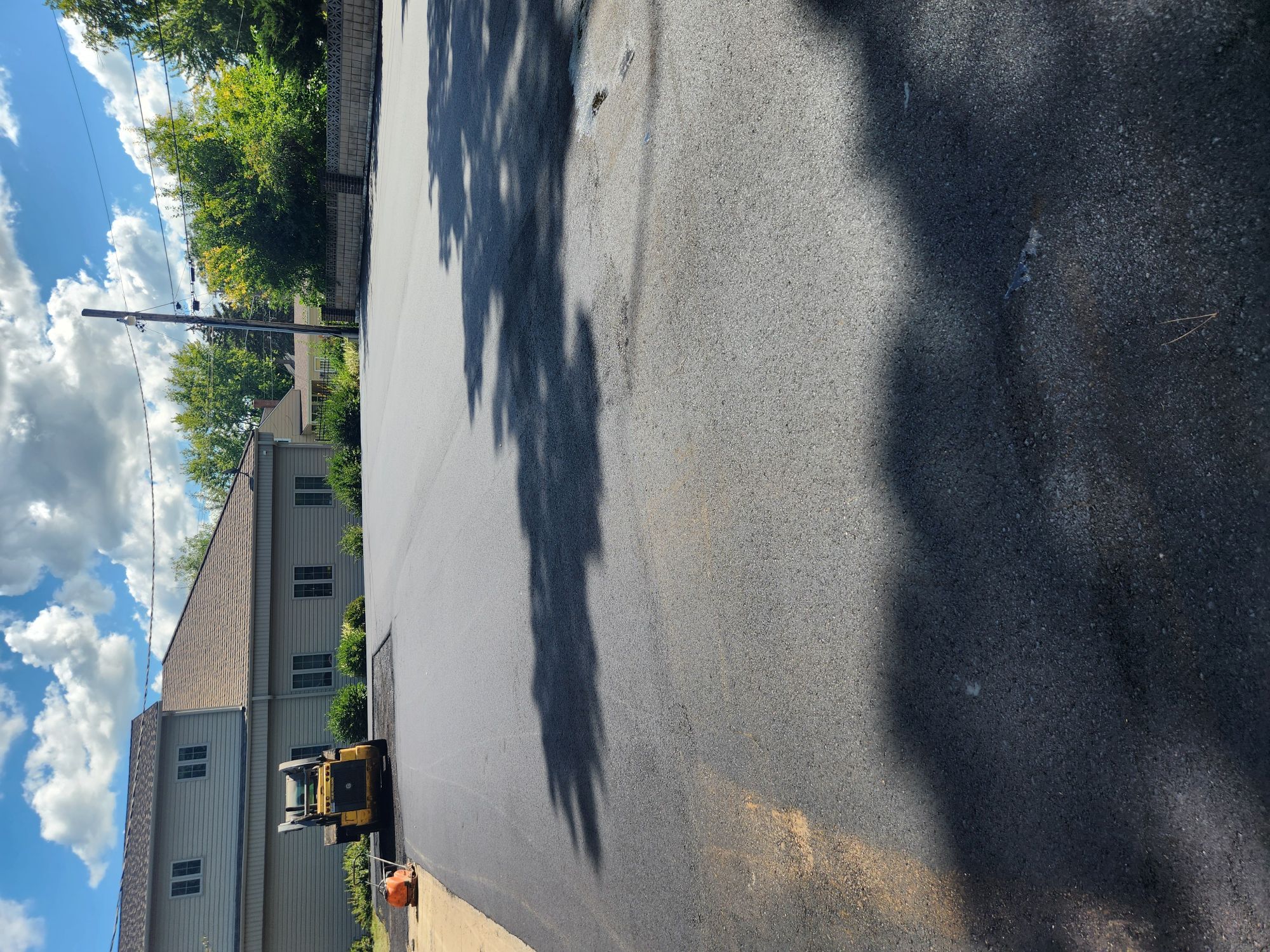 Freshly sealcoated asphalt surface